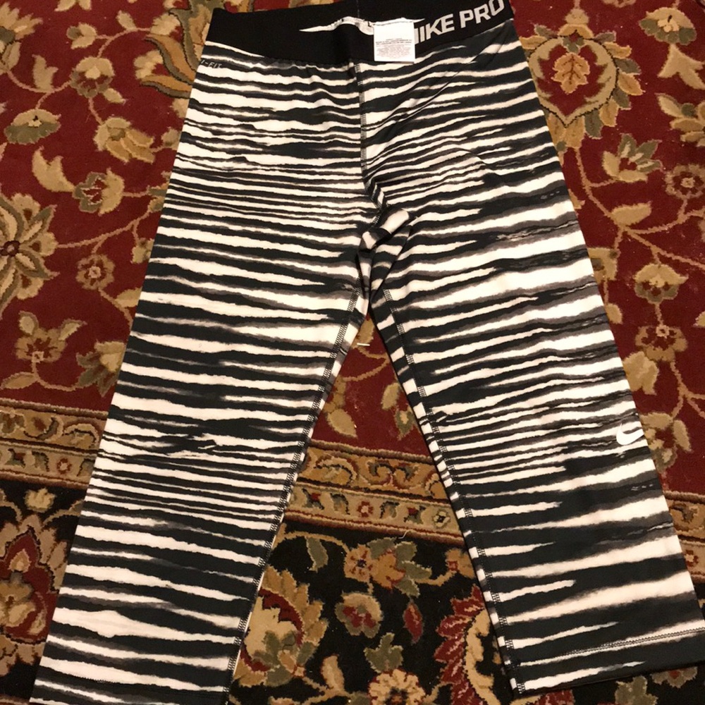 Nike cropped black and white stripped leggings.